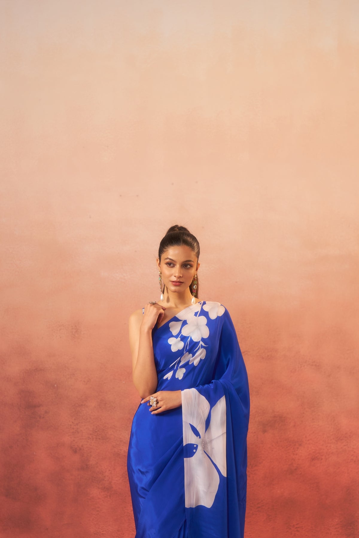 Neelphool – Blue Saree with White Floral Elegance