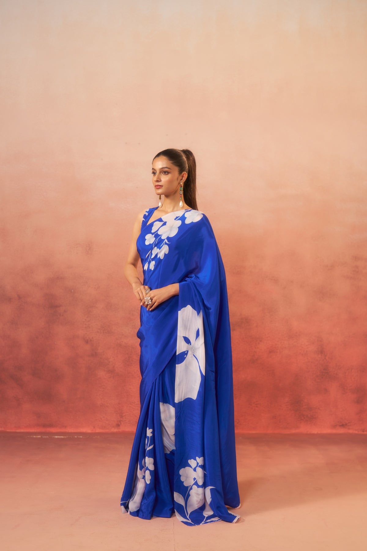 Neelphool – Blue Saree with White Floral Elegance