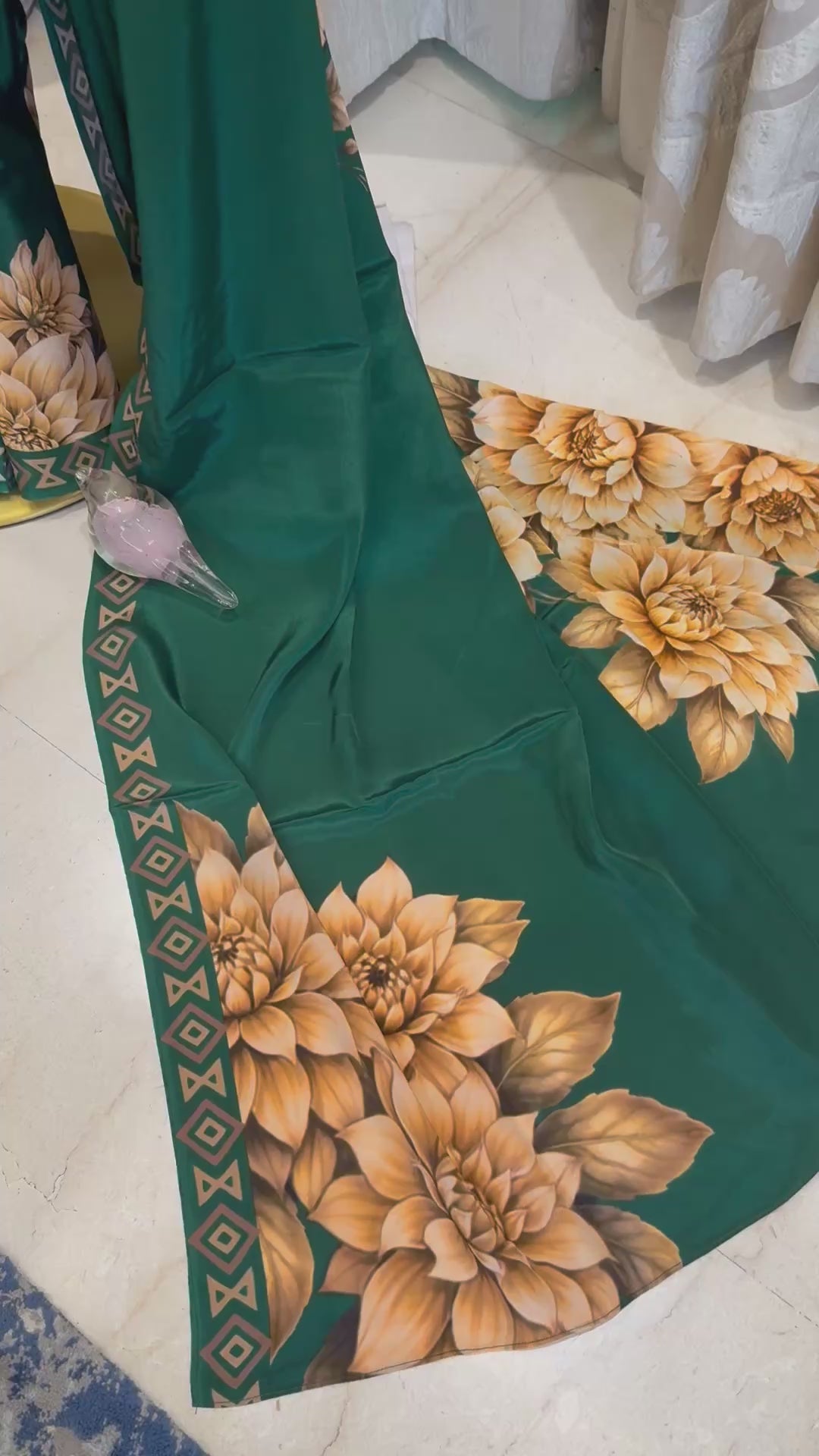 Vanya : Deep forest green canvas with detailed ochre-gold floral motifs and a geometric border.